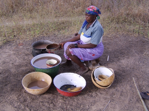 Tontono Ɗanjuma making guineacorn beer, a complex process taking several days